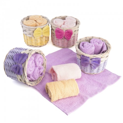 Canasta con tres toallas 